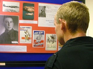 Young cadet looking at exhibits